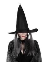 Black witch on white background photo