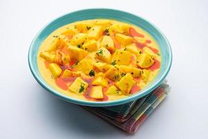 Dahi Aloo sabzi or curd potato curry photo