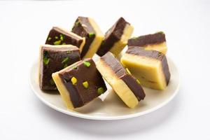 Choco Vanilla Patisa or chocolate mawa barfi or or two layered burfi, Indian sweet or dessert photo