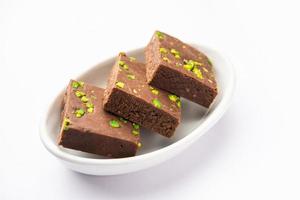 chocolate barfi or choco burfi cake, a tweak to indian dessert or sweet for festivals photo