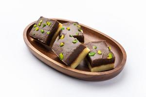 Choco Vanilla Patisa or chocolate mawa barfi or or two layered burfi, Indian sweet or dessert photo