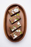 chocolate barfi or choco burfi cake, a tweak to indian dessert or sweet for festivals photo