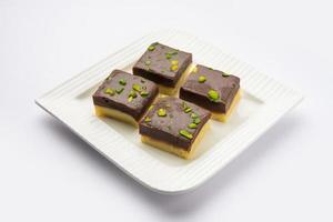 Choco Vanilla Patisa or chocolate mawa barfi or or two layered burfi, Indian sweet or dessert photo