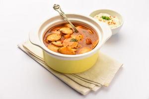 mini idli or idlies with sambar and coconut chutney- South Indian breakfast photo