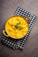 Dahi Aloo sabzi or curd potato curry photo