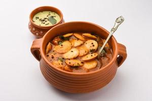 mini idli or idlies with sambar and coconut chutney- South Indian breakfast photo
