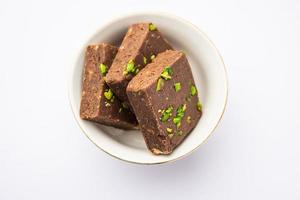 chocolate barfi or choco burfi cake, a tweak to indian dessert or sweet for festivals photo