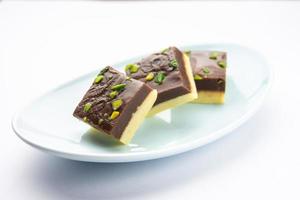 Choco Vanilla Patisa or chocolate mawa barfi or or two layered burfi, Indian sweet or dessert photo