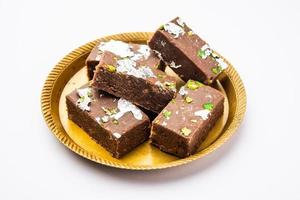 chocolate barfi or choco burfi cake, a tweak to indian dessert or sweet for festivals photo