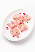 Rose Kalakand pink barfi or burfi also known as flavoured Mishri Mava Or Khoa Milkcake mithai photo