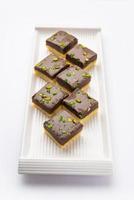 Choco Vanilla Patisa or chocolate mawa barfi or or two layered burfi, Indian sweet or dessert photo