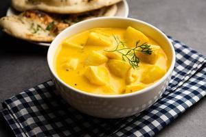 Dahi Aloo sabzi or curd potato curry photo