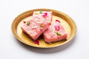 Rose Kalakand pink barfi or burfi also known as flavoured Mishri Mava Or Khoa Milkcake mithai photo