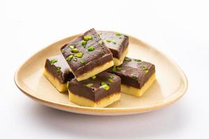 Choco Vanilla Patisa or chocolate mawa barfi or or two layered burfi, Indian sweet or dessert photo