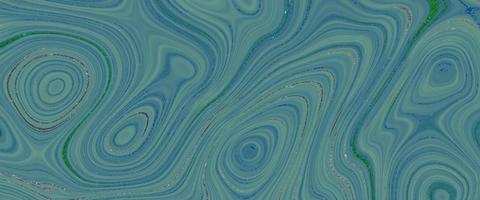 Colorful and fancy colored liquify background. Glossy liquid acrylic paint texture. Liquid fluid abstract marble texture. Colorful smooth swirls background. Beautiful Marbling. Papercut style liquify. photo