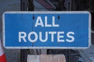 all routes direction sign photo