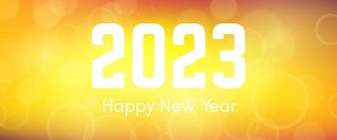 Happy new year 2023 incription on blurred background vector