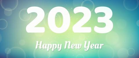 Happy new year 2023 incription on blurred background vector