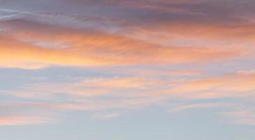 Dramatic colorful sky with afterglow and illuminated clouds photo