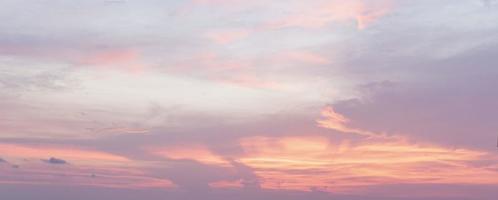 Dramatic colorful sky with afterglow and illuminated clouds photo