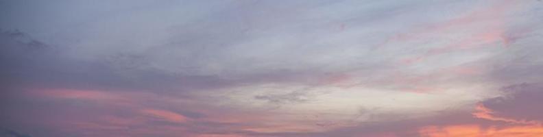 Dramatic colorful sky with afterglow and illuminated clouds photo