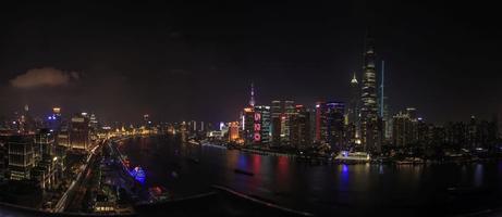 Panoramic areal view on the Bund in Shanghai at night in summer photo