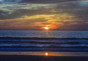 Sunset at Kamala Beach on Phuket island photo