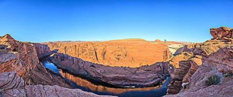 Panoramic picture of Colorado river with Glen Canyon Dam in the morning photo