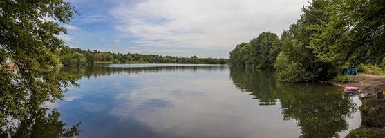 Panoramic view over Bornbruch Lake between cities Darmstadt and Frankfurt photo