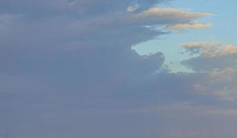 Image of a partly cloudy and partly clear sky during the day photo