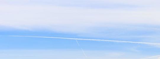 Image of a partly cloudy and partly clear sky during the day photo