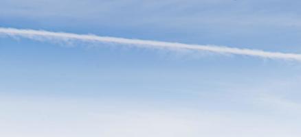 Image of a partly cloudy and partly clear sky during the day photo