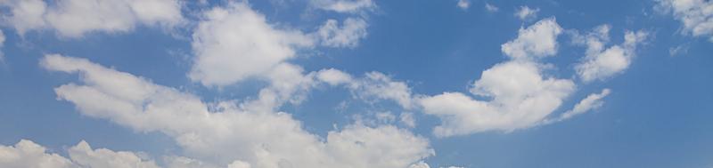 Image of a partly cloudy and partly clear sky during the day photo