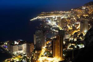 Monte Carlo panorama illuminated by night. Urban landscape with luxury architecture. photo