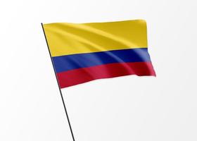 Colombia flag flying high in the isolated background Colombia independence day photo