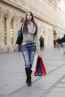 Young woman in Christmas shopping photo