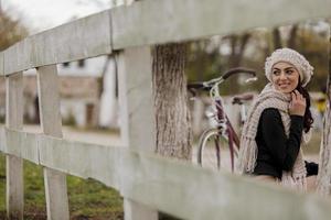 Young woman with a bicycle photo