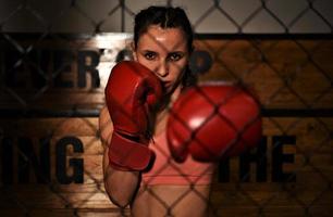 MMA woman fighter tough chick boxer punch pose pretty exercise training cross fit athlete photo