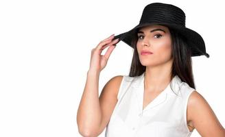 beautiful woman in a black broad-brim hat photo