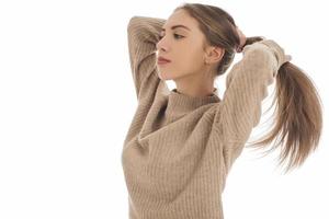 Portrait of a gorgeous young brunette woman with healthy hair. photo