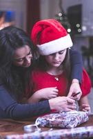 A happy Christmas concept. Mother and Daughter in a Christmas mood. photo