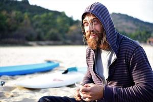 Man relaxing at beach photo