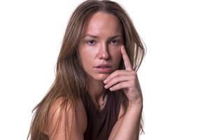 artistic view of depressed female model posing in studio photo