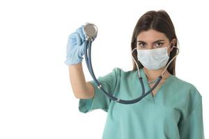 Female doctor or nurse holding stethoscope. Medical person for health insurance photo