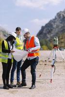 Construction team engineers speak to architects at construction sites or construction sites for high rise buildings, photo