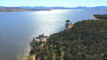 The aerial drone point of view footage at Bowna Waters Reserve is natural parkland on the foreshore of Lake Hume popular boat launching location in Albury, NSW ,Australia. video