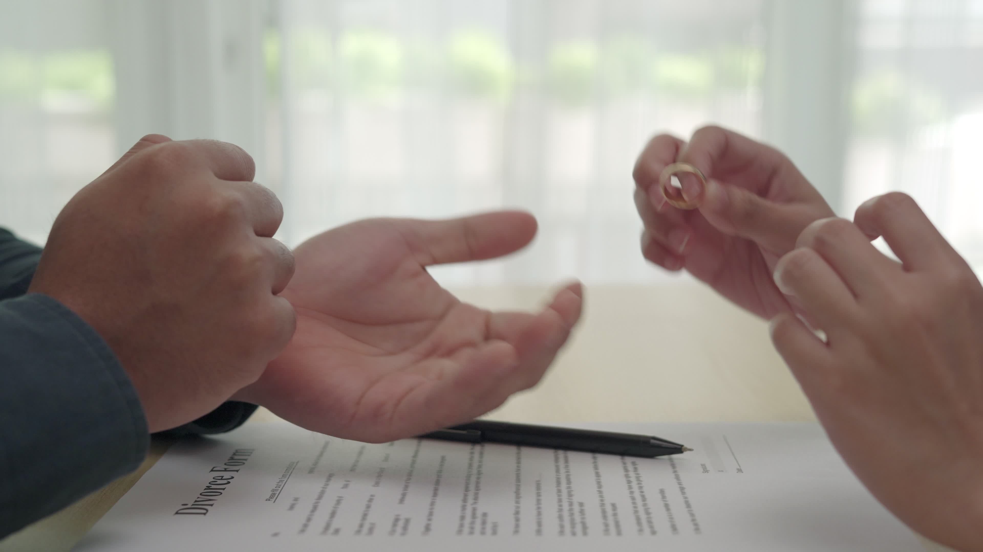 The wife returns the wedding ring to her husband on the day of the