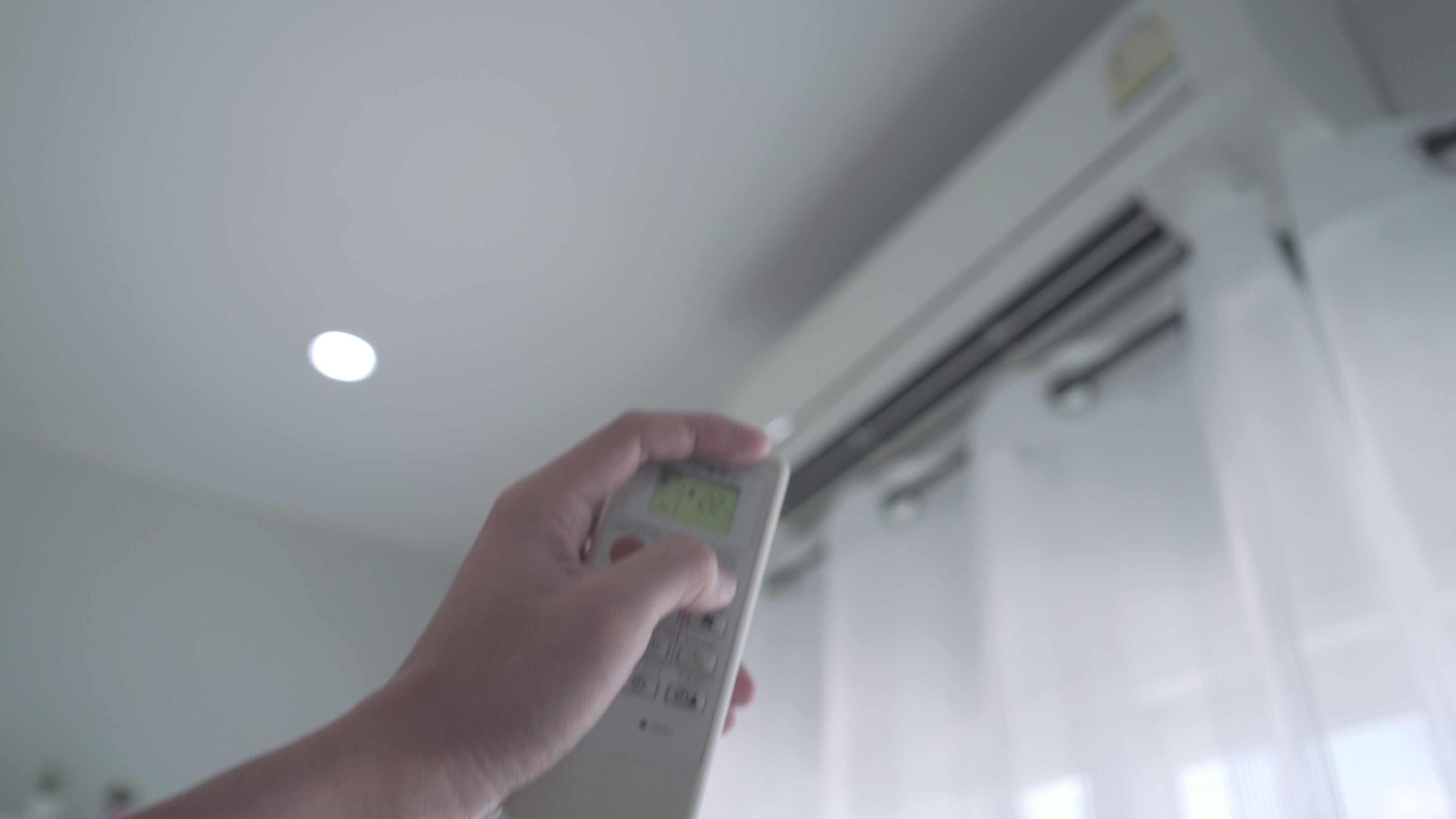 Employees are change the air conditioner temperature to 25 degrees to