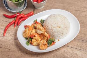 Shrimp basil with steamed rice.Thai spicy food.Street food photo