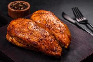 Delicious grilled chicken fillet with spices and herbs